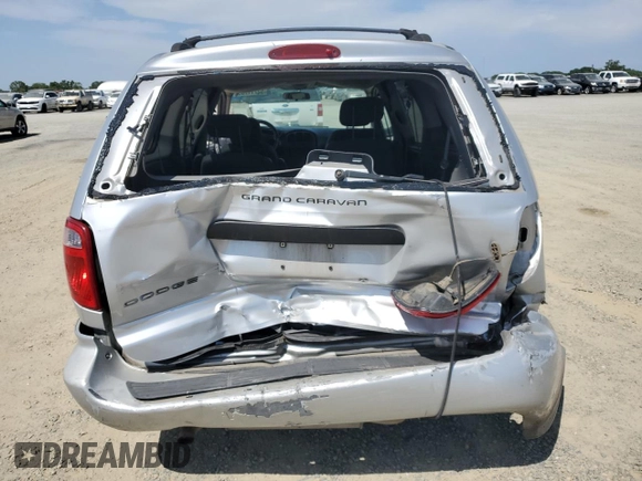 2007 Dodge Grand Caravan SE with VIN 1D4GP24R17B165507, listed as a Copart auction lot 52711705 with 200,729 mi miles and Salvage Title. Bid and sale history available at DreamBid. Image 6.