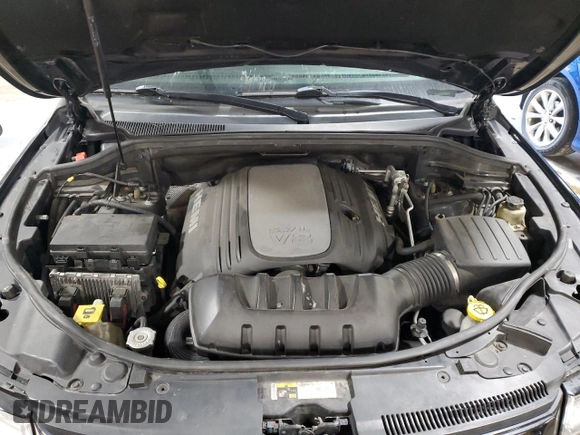 2014 Jeep Grand Cherokee Overland with VIN 1C4RJFCT9EC264594, listed as a Copart auction lot 50071695 with 124,712 mi miles and Clean Title. Bid and sale history available at DreamBid. Image 12.