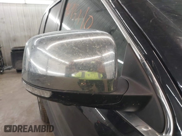 2014 Jeep Grand Cherokee Overland with VIN 1C4RJFCG8EC177899, listed as a IAAI auction lot 41695290 with 200,867 mi miles and . Bid and sale history available at DreamBid. Image 12.