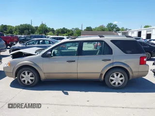 2005 Ford Freestyle SE z VIN 1FMZK01115GA63370, wystawiony jako IAAI lot #41882239 z przebiegiem 139 257 mil mil oraz . Historia ofert i sprzedaży dostępna na DreamBid. Obrazek 14.