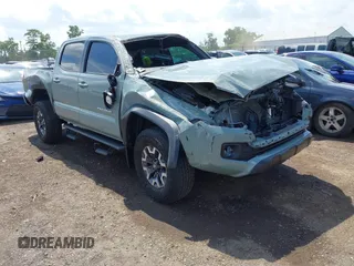 2023 Toyota Tacoma SR with VIN 3TMCZ5AN1PM581266, listed as a IAAI auction lot 42371395 with 32,582 mi miles and . Bid and sale history available at DreamBid. Image 1.