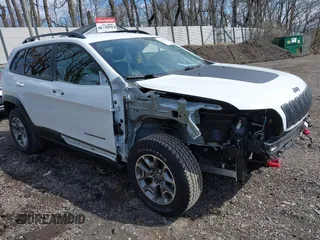 2022 Jeep Cherokee Trailhawk with VIN 1C4PJMBX0ND545659, listed as a IAAI auction lot 41985121 with 26,397 mi miles. Bid and sale history available at carsss.com. Image 1.