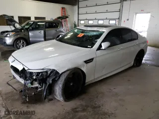 2016 BMW M5 with VIN WBSFV9C51GD595685, listed as a Copart auction lot 75558693 with 0 mi miles. Bid and sale history available at carsss.com. Image 1.