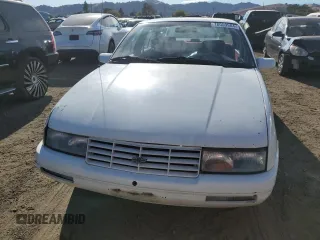 1995 Chevrolet Corsica z VIN 1G1LD5548SY236130, wystawiony jako Copart lot #78059984 z przebiegiem 280 703 mil mil oraz Tytuł czysty. Historia ofert i sprzedaży dostępna na DreamBid. Obrazek 5.