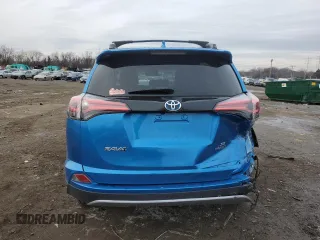 2017 Toyota RAV4 Hybrid SE with VIN JTMJJREV1HD120971, listed as a Copart auction lot 86187384 with 79,887 mi miles and Salvage Title. Bid and sale history available at carsss.com. Image 6.
