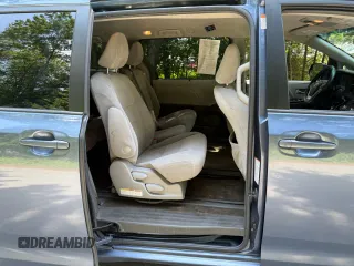 2015 Toyota Sienna LE AAS with VIN 5TDKK3DC1FS623710, listed as a Copart auction lot 62335575 with 221,148 mi miles and Clean title. Bid and sale history available at DreamBid. Image 6.