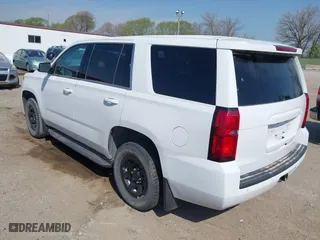 2020 Chevrolet Tahoe Commercial with VIN 1GNSKDEC8LR258254, listed as a IAAI auction lot 42104608 with 105,895 mi miles. Bid and sale history available at carsss.com. Image 3.