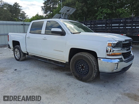2018 Chevrolet Silverado 1500 LT with VIN 3GCPCREC3JG620531, listed as a Copart auction lot 54795545 with 130,608 mi miles and Clean Title. Bid and sale history available at DreamBid. Image 4.