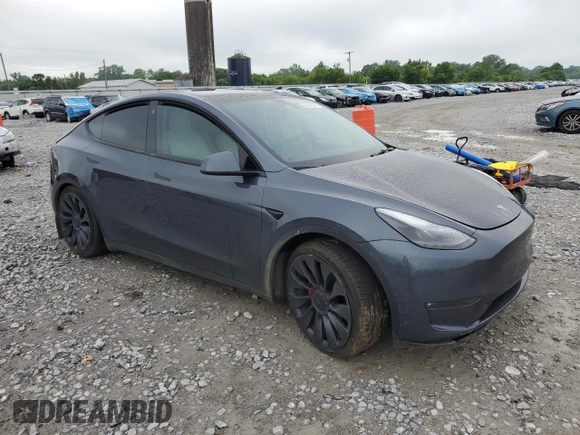 2022 Tesla Model Y Performance with VIN 7SAYGDEF7NF507184, listed as a Copart auction lot 58329875 with 98,320 mi miles and Salvage title. Bid and sale history available at DreamBid. Image 4.