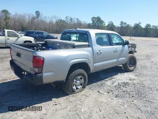 2017 Toyota Tacoma SR with VIN 5TFAX5GN7HX101599, listed as a IAAI auction lot 41762674 with 160,973 mi miles. Bid and sale history available at carsss.com. Image 4.