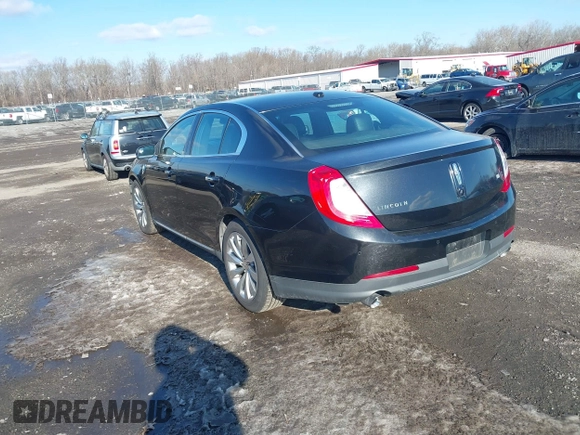 2014 Lincoln MKS with VIN 1LNHL9DKXEG606359, listed as a IAAI auction lot 41341206 with 286,687 mi miles and . Bid and sale history available at DreamBid. Image 3.