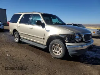 2000 Ford Expedition XLT with VIN 1FMRU15LXYLB33052, listed as a Copart auction lot 43271215 with 199,675 mi miles and Salvage Title. Bid and sale history available at carsss.com. Image 4.