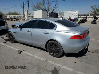 2019 Jaguar XE 25t with VIN SAJAR4FX6KCP49670, listed as a Copart auction lot 75340594 with 71,282 mi miles and Salvage Title. Bid and sale history available at carsss.com. Image 2.