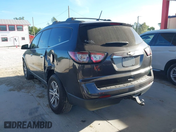 2015 Chevrolet Traverse LT with VIN 1GNKRHKD3FJ206601, listed as a IAAI auction lot 41855672 with 156,105 mi miles and . Bid and sale history available at DreamBid. Image 3.