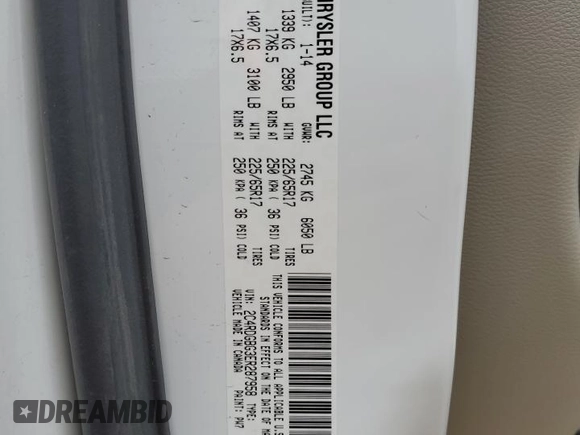 2014 Dodge Grand Caravan SE 30th Anniversary with VIN 2C4RDGBG3ER287958, listed as a Copart auction lot 54224835 with 133,858 mi miles and Salvage Title. Bid and sale history available at DreamBid. Image 13.