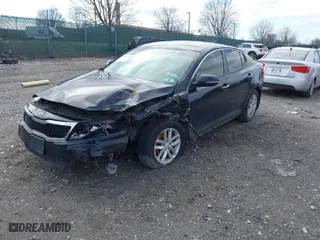 2012 Kia Optima LX with VIN 5XXGM4A7XCG017199, listed as a IAAI auction lot 41811678 with 168,691 mi miles. Bid and sale history available at carsss.com. Image 2.