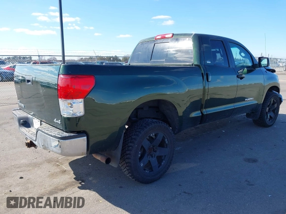 2011 Toyota Tundra 4WD Truck with VIN 5TFUM5F18BX020803, listed as a IAAI auction lot 41856078 with 110,119 mi miles. Bid and sale history available at carsss.com. Image 4.