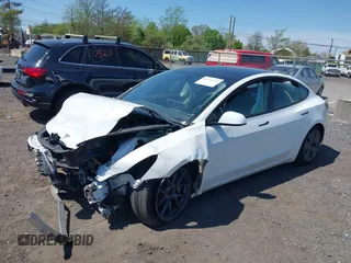 2023 Tesla Model 3 z VIN 5YJ3E1EA5PF553275, wystawiony jako IAAI lot #42132154 z przebiegiem Nie podano mil oraz . Historia ofert i sprzedaży dostępna na DreamBid. Obrazek 2.