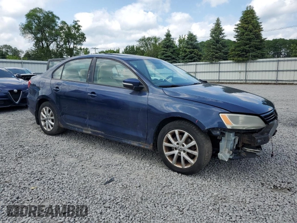 2012 Volkswagen Jetta SE with VIN 3VWDP7AJXCM392741, listed as a Copart auction lot 61436215 with 169,452 mi miles and Salvage title. Bid and sale history available at DreamBid. Image 4.