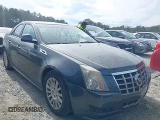 2012 Cadillac CTS Luxury with VIN 1G6DE5E58C0143175, listed as a IAAI auction lot 41612743 with 148,764 mi miles and . Bid and sale history available at DreamBid. Image 1.