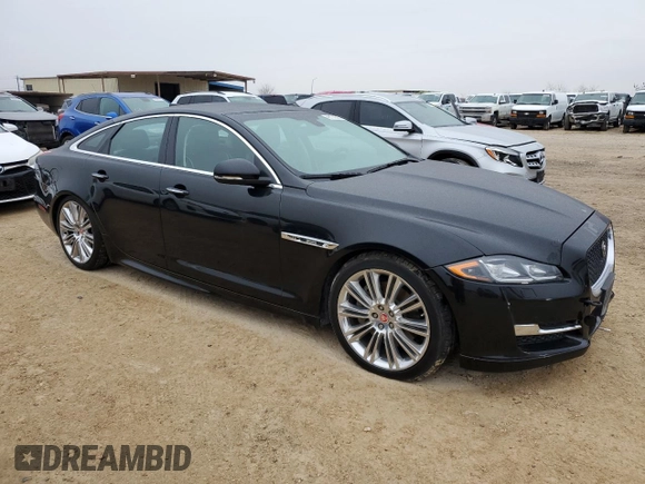 2017 Jaguar XJ R-Sport with VIN SAJWA1C77H8W04956, listed as a Copart auction lot 45174505 with 142,002 mi miles and Salvage title. Bid and sale history available at DreamBid. Image 4.