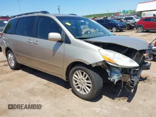 2010 Toyota Sienna XLE z VIN 5TDYK4CC3AS331874, wystawiony jako IAAI lot #42284788 z przebiegiem 219 904 mil mil oraz . Historia ofert i sprzedaży dostępna na DreamBid. Obrazek 1.