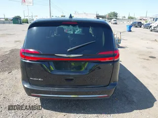2023 Chrysler Pacifica Touring L with VIN 2C4RC1BG9PR628170, listed as a IAAI auction lot 42515590 with 41,987 mi miles and . Bid and sale history available at DreamBid. Image 16.