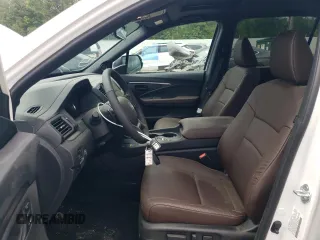 2024 Honda Passport EX-L z VIN 5FNYF8H50RB023552, wystawiony jako Copart lot #58101325 z przebiegiem 573 mil mil oraz Tytuł czysty. Historia ofert i sprzedaży dostępna na DreamBid. Obrazek 7.