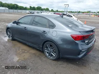2021 Kia Forte GT-Line z VIN 3KPF34AD9ME293470, wystawiony jako IAAI lot #42335104 z przebiegiem 75 132 mil mil oraz . Historia ofert i sprzedaży dostępna na DreamBid. Obrazek 3.