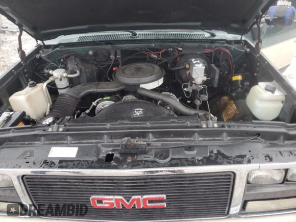1990 GMC Suburban с VIN 1GKGR26K8LF528125, выставлен на аукционе Copart как лот 84931724 с пробегом Не указан миль и Списание • Salvage title. История ставок и продаж доступна на DreamBid. Изображение 13.