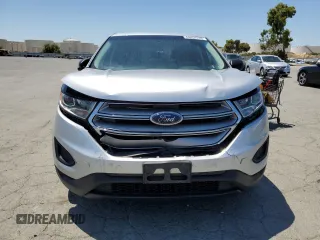 2015 Ford Edge SE with VIN 2FMTK3G97FBC40534, listed as a Copart auction lot 63452225 with 146,659 mi miles and Salvage title. Bid and sale history available at DreamBid. Image 5.