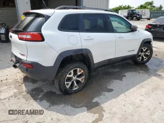 2015 Jeep Cherokee Trailhawk with VIN 1C4PJMBS8FW717950, listed as a Copart auction lot 60321625 with 155,210 mi miles and Salvage title. Bid and sale history available at DreamBid. Image 3.