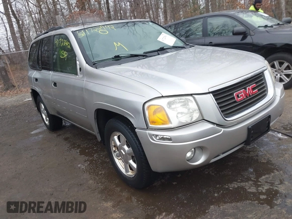 2004 GMC Envoy SLT with VIN 1GKDT13S242398113, listed as a IAAI auction lot 41722942 with 175,173 mi miles and . Bid and sale history available at DreamBid. Image 1.