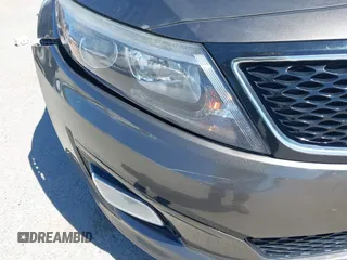 2015 Kia Optima LX with VIN 5XXGM4A74FG396236, listed as a IAAI auction lot 42165862 with 127,383 mi miles. Bid and sale history available at carsss.com. Image 6.
