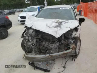 2015 Ford Fiesta S z VIN 3FADP4AJ0FM140721, wystawiony jako Copart lot #58148075 z przebiegiem 121 404 mil mil oraz Szkoda całkowita • Salvage title. Historia ofert i sprzedaży dostępna na DreamBid. Obrazek 5.