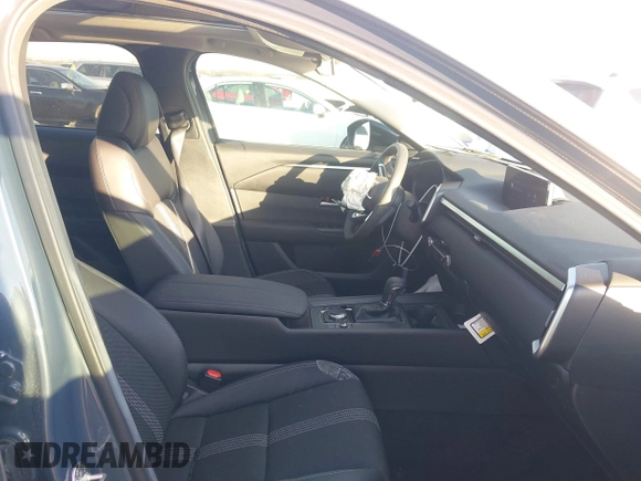 2024 Mazda CX-50 S Premium with VIN 7MMVABDM1RN201756, listed as a IAAI auction lot 41282874 with 2,019 mi miles and . Bid and sale history available at DreamBid. Image 5.