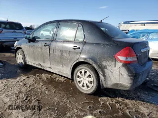 2009 Nissan Versa 1.8 S with VIN 3N1BC11E59L403040, listed as a Copart auction lot 42345715 with 193,671 mi miles and Salvage Title. Bid and sale history available at carsss.com. Image 2.