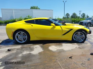 2016 Chevrolet Corvette 1LT z VIN 1G1YB2D77G5111974, wystawiony jako IAAI lot #42134341 z przebiegiem 28 287 mil mil oraz . Historia ofert i sprzedaży dostępna na DreamBid. Obrazek 14.