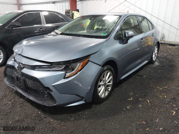 2020 Toyota Corolla LE with VIN JTDHPRAE2LJ092143, listed as a IAAI auction lot 42011827 with 49,388 mi miles. Bid and sale history available at carsss.com. Image 2.