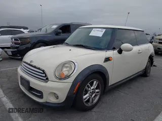 2011 MINI Hardtop with VIN WMWSU3C56BT093403, listed as a IAAI auction lot 42795188 with 123,454 mi miles and . Bid and sale history available at DreamBid. Image 2.