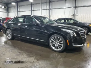2018 Cadillac CT6 Luxury AWD z VIN 1G6KD5RSXJU102871, wystawiony jako Copart lot #54579165 z przebiegiem 31 219 mil mil oraz Szkody całkowita. Historia ofert i sprzedaży dostępna na DreamBid. Obrazek 4.