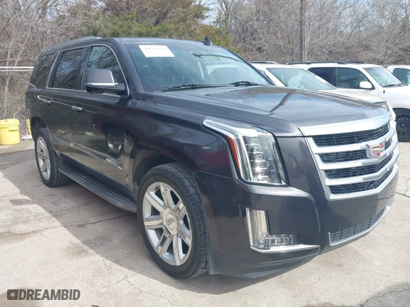 2015 Cadillac Escalade Luxury with VIN 1GYS3MKJ6FR643190, listed as a IAAI auction lot 41689594 with 134,682 mi miles. Bid and sale history available at carsss.com. Image 1.