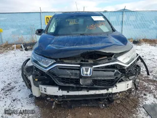 2020 Honda CR-V Hybrid EX-L with VIN 7FART6H86LE006441, listed as a IAAI auction lot 41032430 with 67,426 mi miles. Bid and sale history available at carsss.com. Image 6.