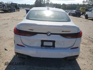 2020 BMW 2 Series M235i xDrive with VIN WBA13AL07L7F58999, listed as a Copart auction lot 77858084 with 19,833 mi miles and Salvage Title. Bid and sale history available at carsss.com. Image 6.