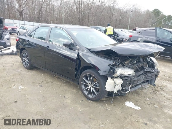 2015 Toyota Camry XLE with VIN 4T1BF1FK9FU921085, listed as a IAAI auction lot 41376788 with 169,884 mi miles and . Bid and sale history available at DreamBid. Image 1.
