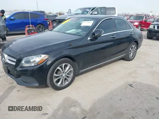 2016 Mercedes-Benz C 300 Luxury with VIN 55SWF4KB8GU174553, listed as a IAAI auction lot 41738974 with 106,683 mi miles and . Bid and sale history available at carsss.com. Image 18.