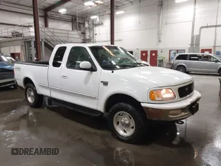 1998 Ford F-150 z VIN 1FTRX18L1WKB99239, wystawiony jako IAAI lot #41987823 z przebiegiem 217 930 mil mil oraz . Historia ofert i sprzedaży dostępna na DreamBid. Obrazek 1.