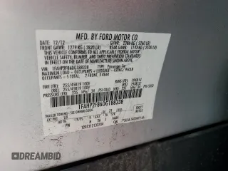 2013 Ford Taurus Limited с VIN 1FAHP2F86DG188338, выставлен на аукционе Copart как лот 58488265 с пробегом 108 433 миль миль и Чистый • Clean title. История ставок и продаж доступна на DreamBid. Изображение 12.
