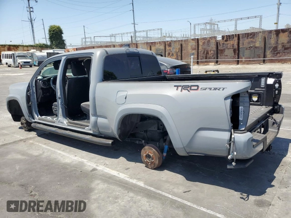 2021 Toyota Tacoma SR5 with VIN 3TMBZ5DNXMM031339, listed as a Copart auction lot 59178515 with 27,885 mi miles and Salvage title. Bid and sale history available at DreamBid. Image 2.