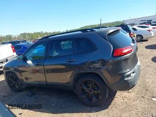2016 Jeep Cherokee Latitude with VIN 1C4PJLCB8GW209598, listed as a IAAI auction lot 41506547 with 122,598 mi miles. Bid and sale history available at carsss.com. Image 14.